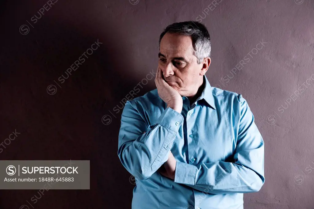 Elderly man with a pensive expression