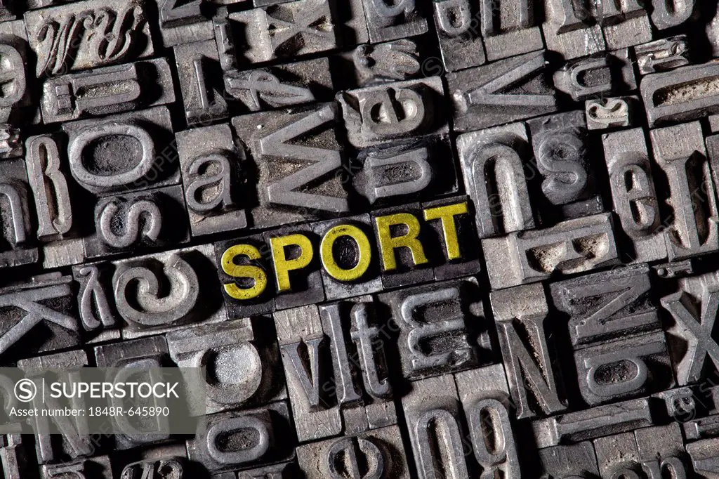 Old lead letters forming the word sport