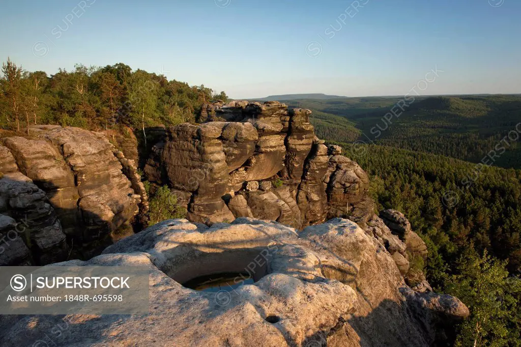 Evening mood from Pfaffenstein table mountain with Opferkessel stone basin in the Elbe Sandstone Mountains, Saxony, Germany, Europe