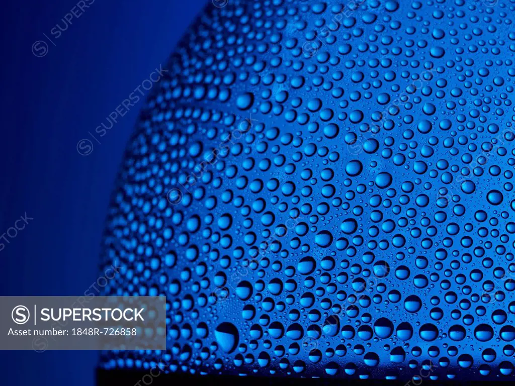 Drops of water on a plastic bottle, detailed view