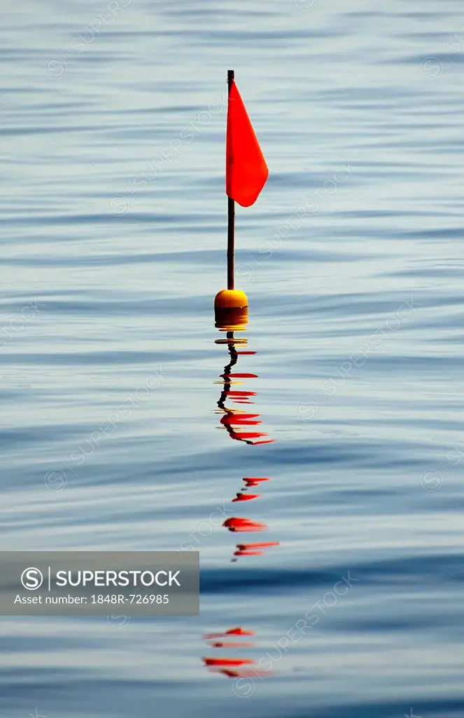 Buoy with a red flag, Mueritz, Mecklenburg-Western Pomerania, Germany, Europe