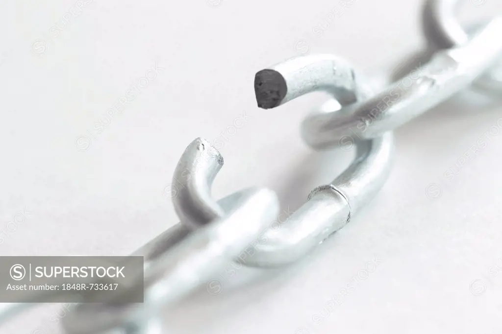 Steel chain with an open link, symbolic image for a chain is only as strong as its weakest link