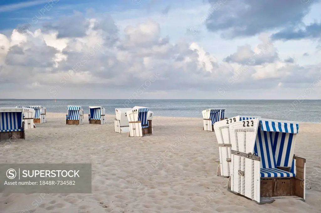 Covered wicker beach chairs on the beach, Hoernum, Sylt island, Schleswig-Holstein, Germany, Europe