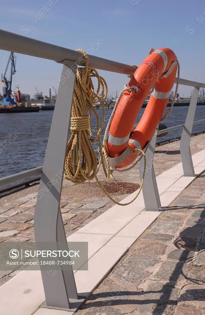 Lifebuoy hanging on a rail, Port of Hamburg, HafenCity, Hamburg, Germany, Europe
