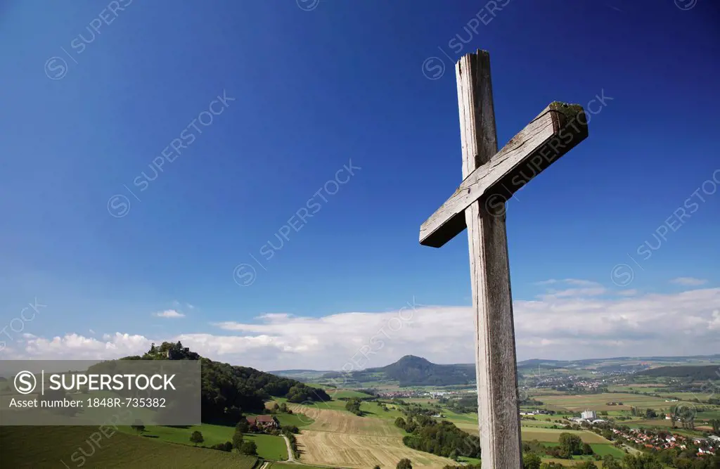 Cross, view of Maegdeberg volcanic mountain, Hegau, Baden-Wuerttemberg, Germany, Europe