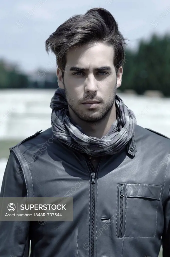 Young man wearing a leather jacket, portrait