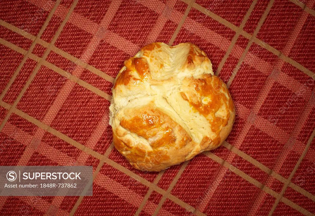 Milk pastry on red fabric