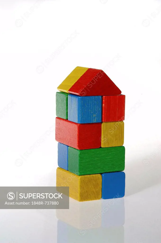 Colourful building blocks assembled in the shape of a tower