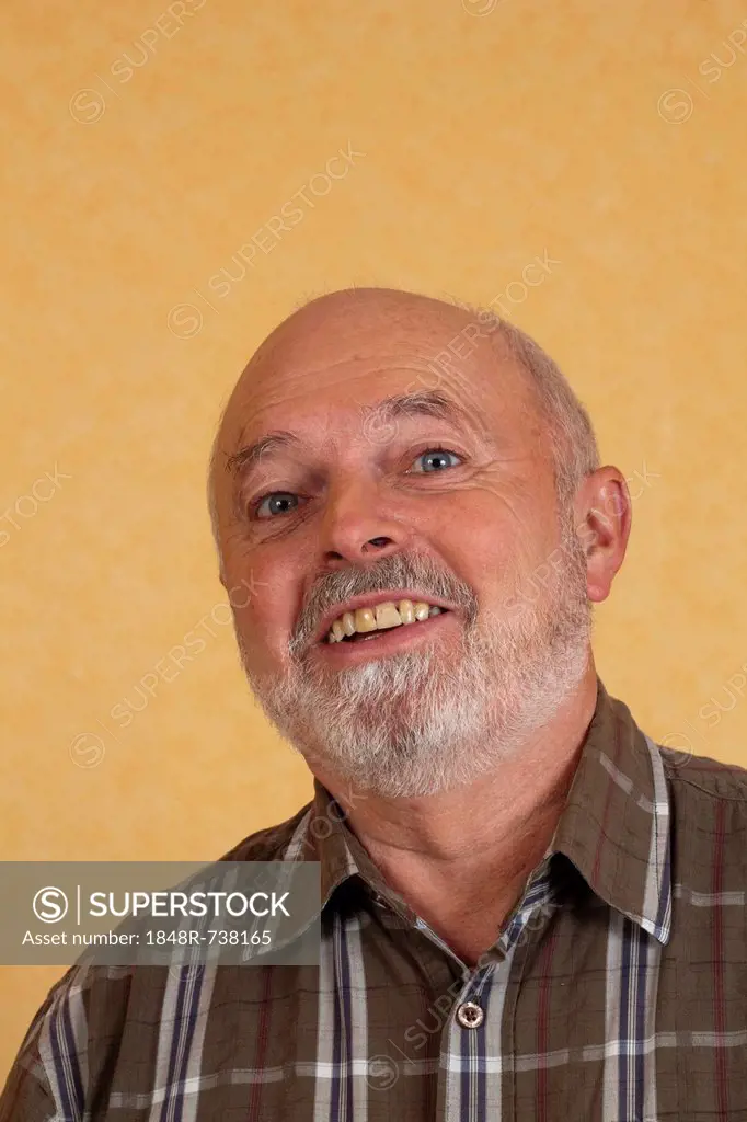Elderly man, 59, laughing
