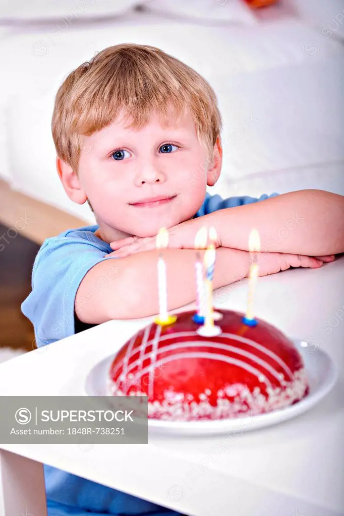 Little boy with a birthday cake