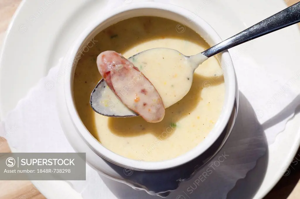 Potato soup with cured sausage