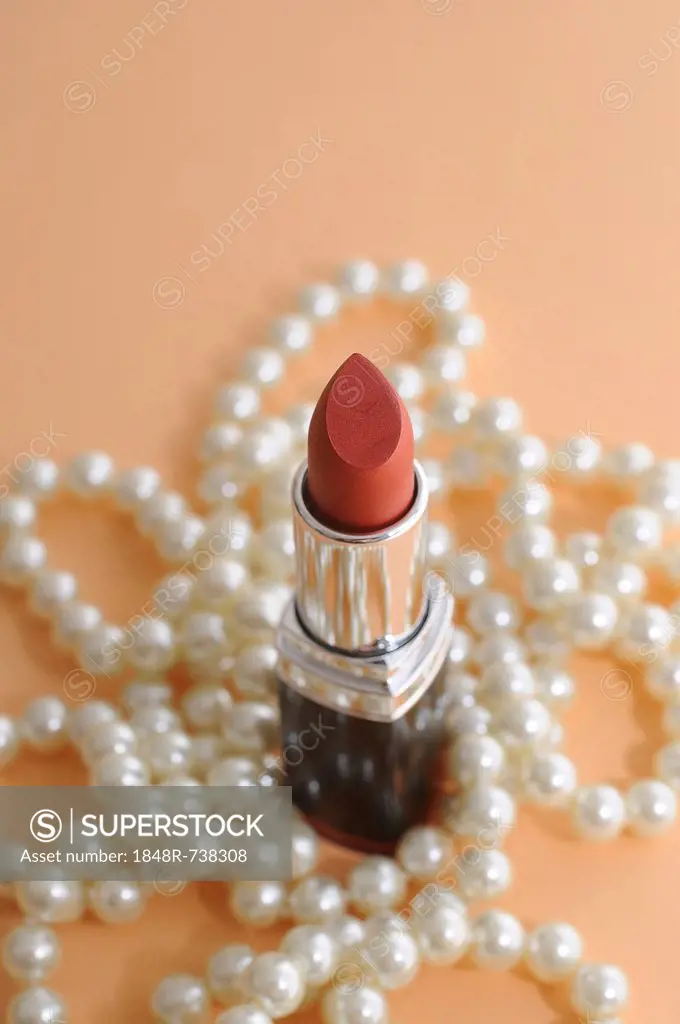 Lipstick with a pearl necklace