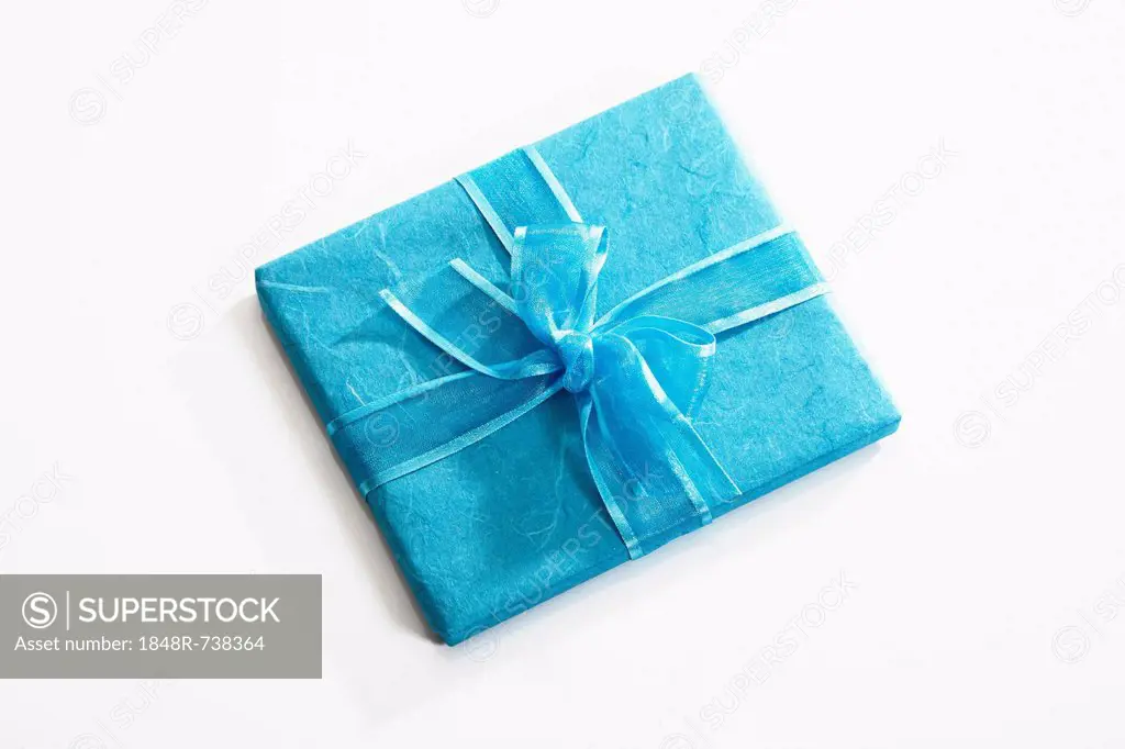 Gift with a turquoise ribbon