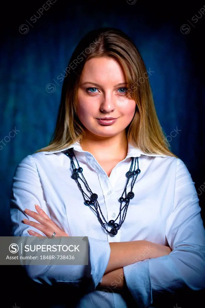 Young woman with arms crossed