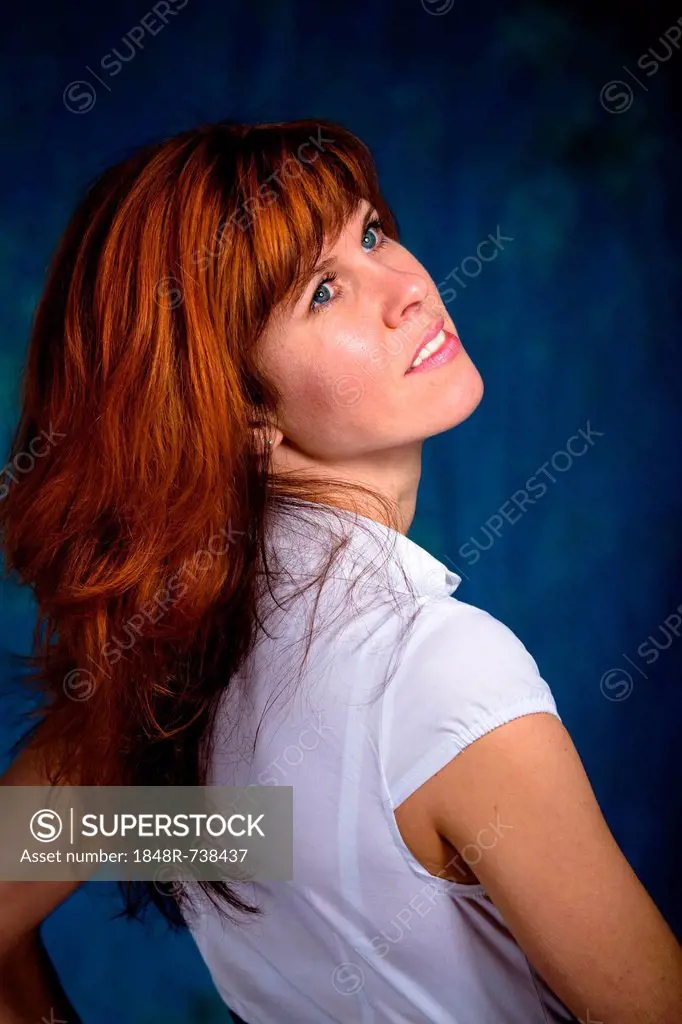 Red-haired young woman, portrait