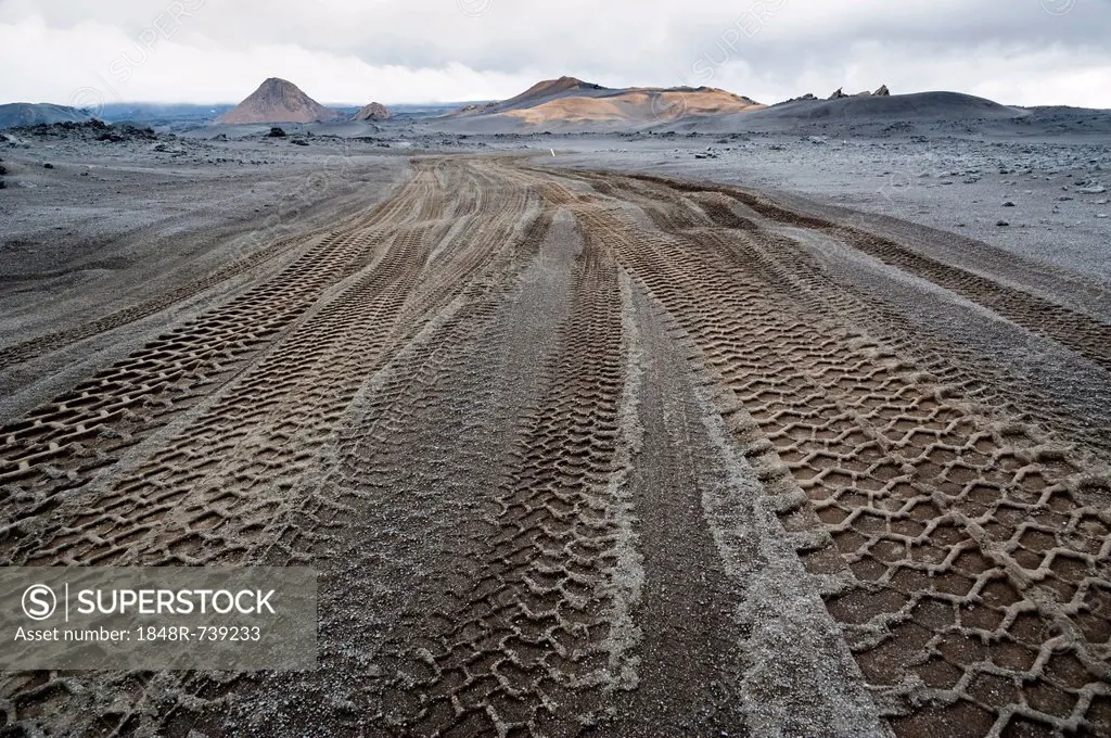 Highland dirt road through lava field, highland, Iceland, Europe