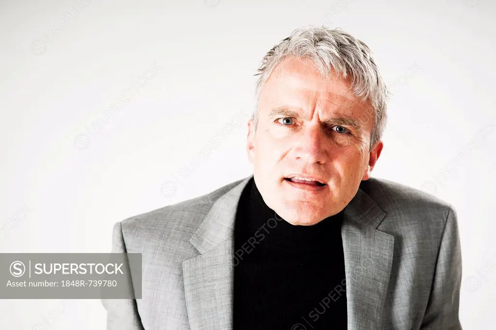 Portrait of a businessman with a surprised face