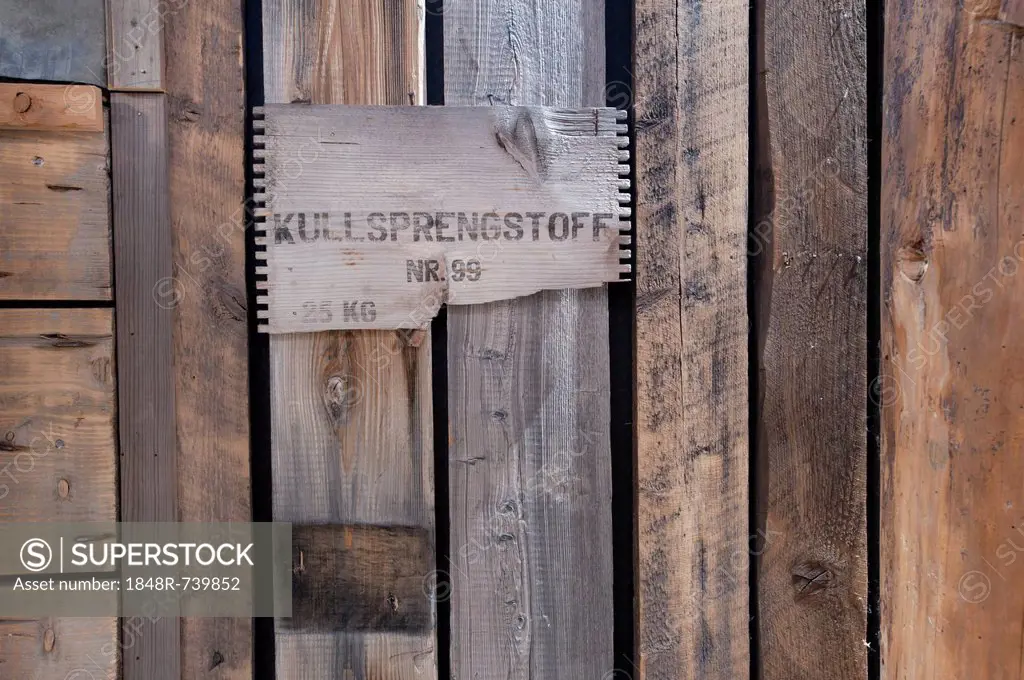 Old wooden planks, part of an explosives' crate, wall decorations, Basecamp Trapper's Hotel, Longyearbyen, Spitsbergen, Svalbard, Norway, Europe