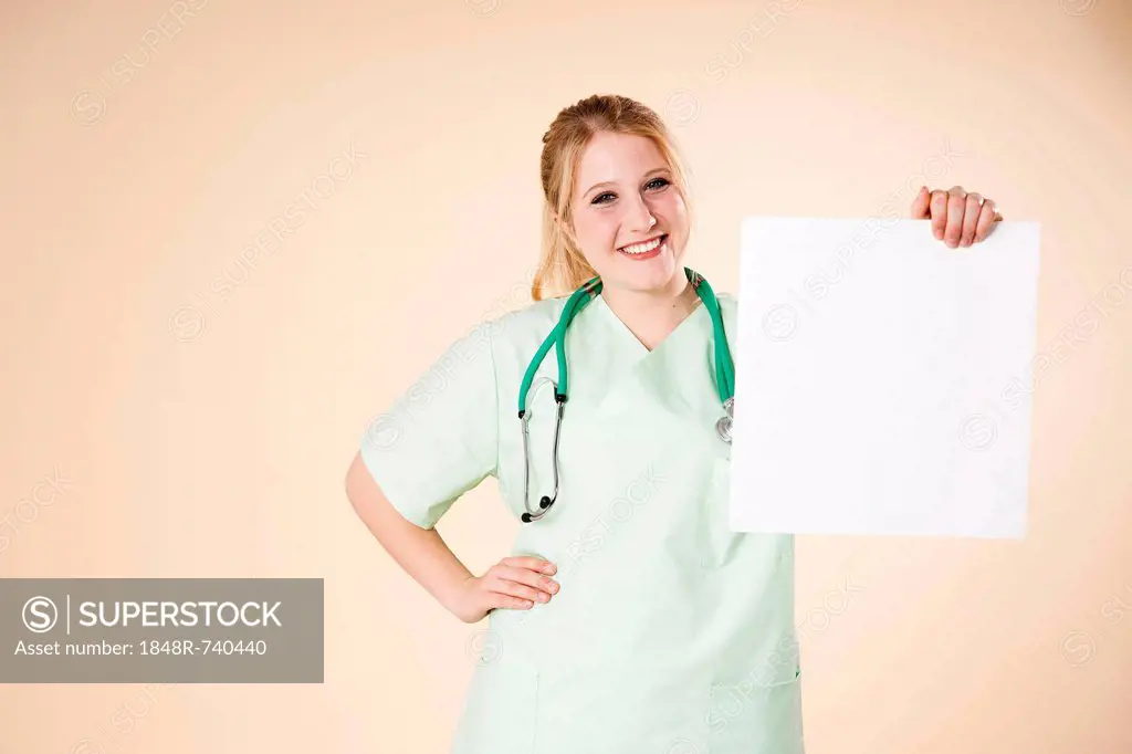 Nurse holding a white board