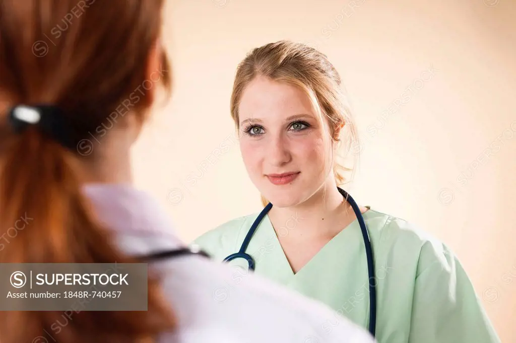 Doctor having a discussion with a nurse