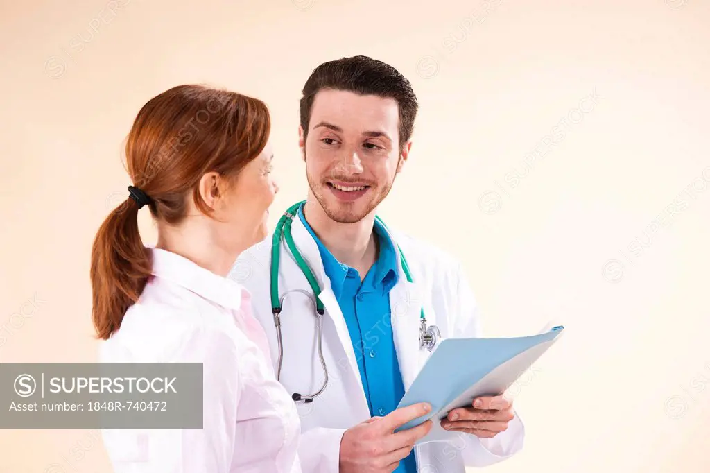 Young doctor in consultation with a patient