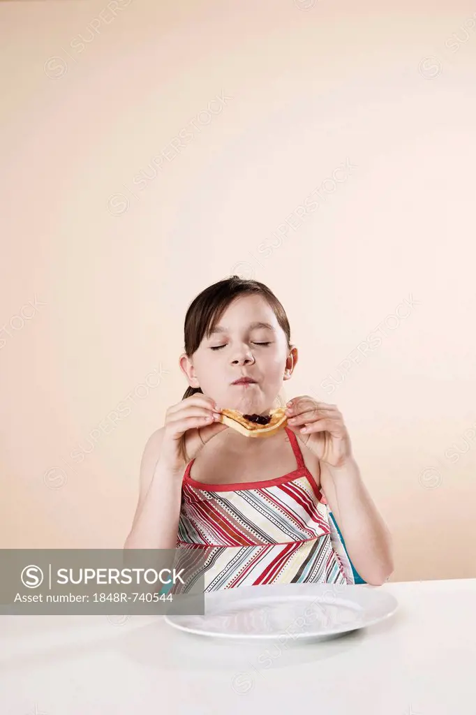 Girl eating a waffle