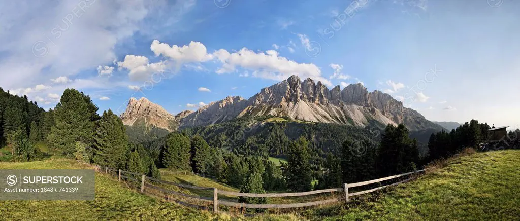 Panoramic view as seen from the Wuerzjoch ridge with the Aferer Geisler Mountains and Peitlerkofel mountain at the back, Villnoesstal valley, province...