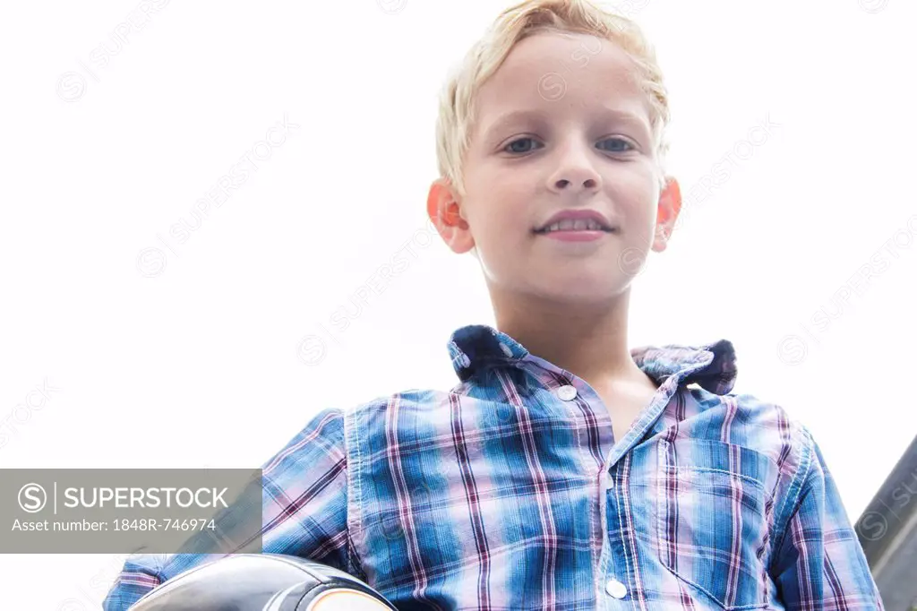 Boy holding a ball
