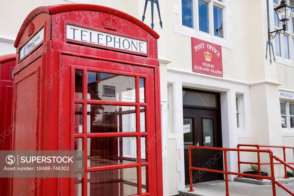English phone booth in front of the post office in Port Stanley, capital of the Falkland Islands, East Falkland, Malvinas Islands, British Overseas Te...