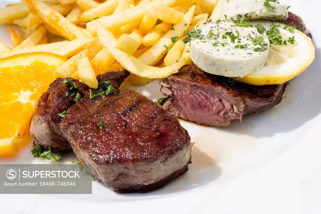 Rump steak, cut, medium, with herbed butter and french fries