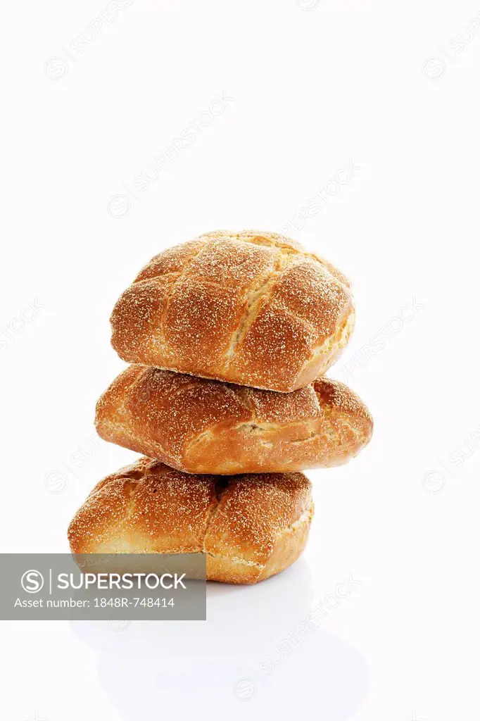 Three stacked wheat rolls