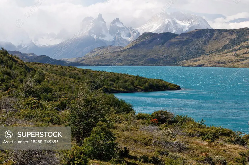 View of the granite mountain Cuernos del Paine in the Torres del Paine National Park on the shore of the glacial lake Lago del Toro, Del Toro Lake, Ma...