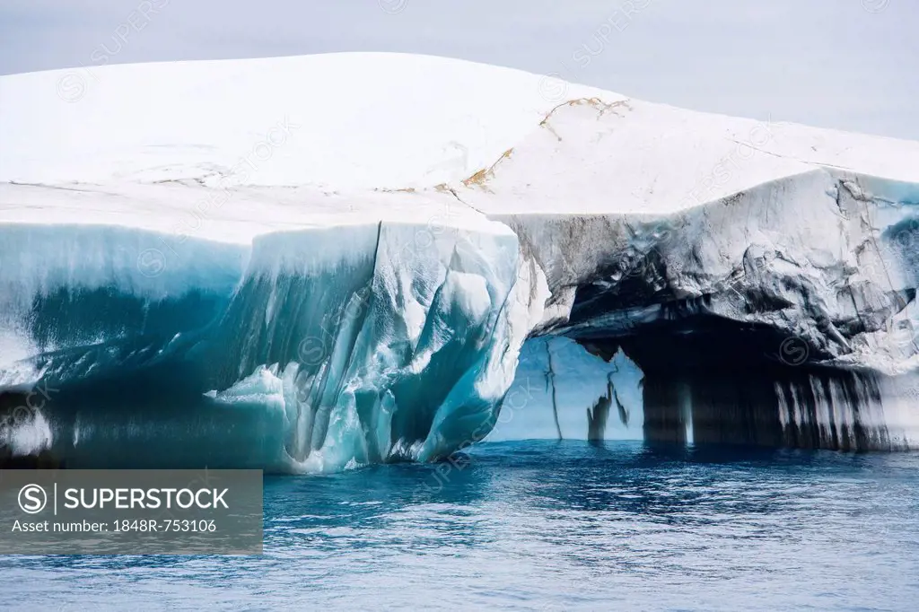Blue and black iceberg off Laurie Island, Washington Strait, South Orkneys, Southern Ocean, Antarctica
