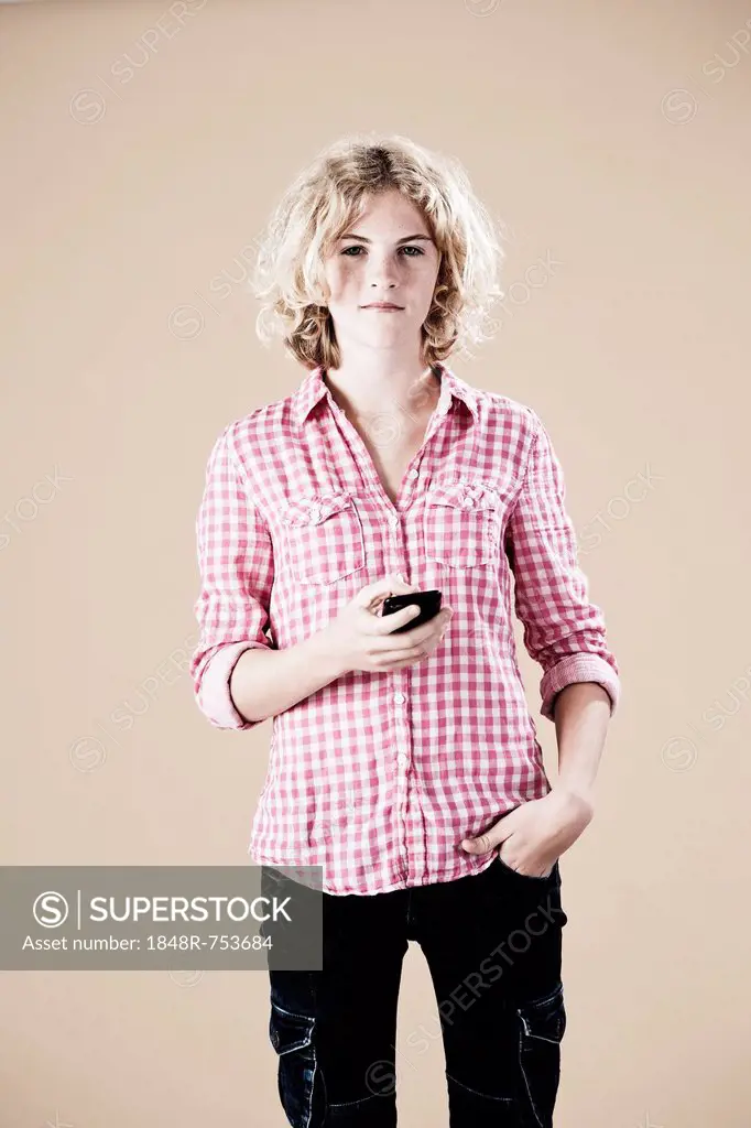 Girl holding a smartphone in her hand