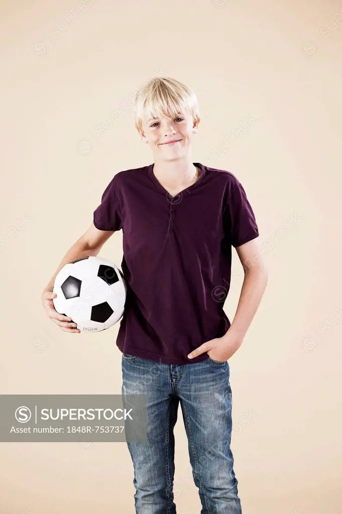 Boy holding a football
