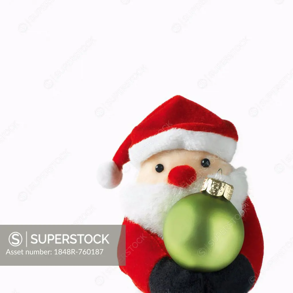 Santa Claus doll holding a Christmas bauble