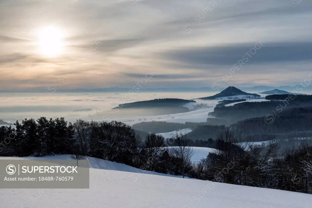 Winter in Hegau with the volcanic cones of Hohenhewen, left, and Hohenstoffeln, right, with the Swiss Alps on the horizon, Hegaublick, Hegau, Baden-Wü...