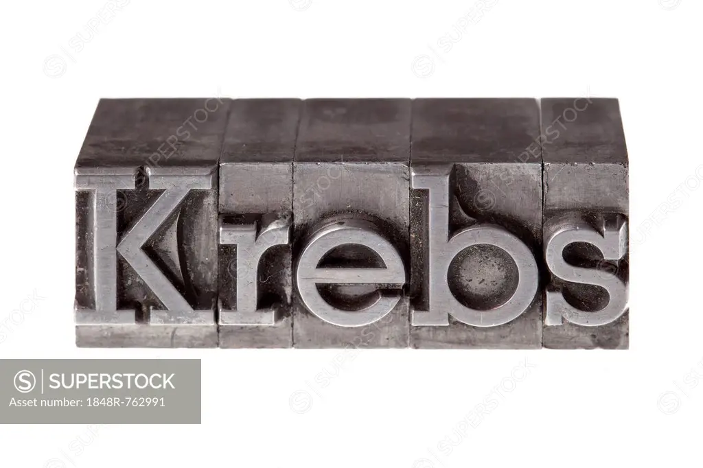 Old lead letters forming the word Krebs, German for cancer