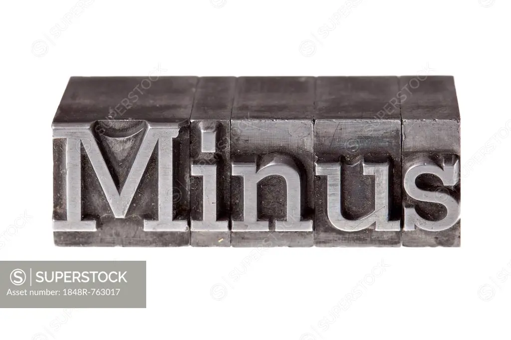 Old lead letters forming the word Minus