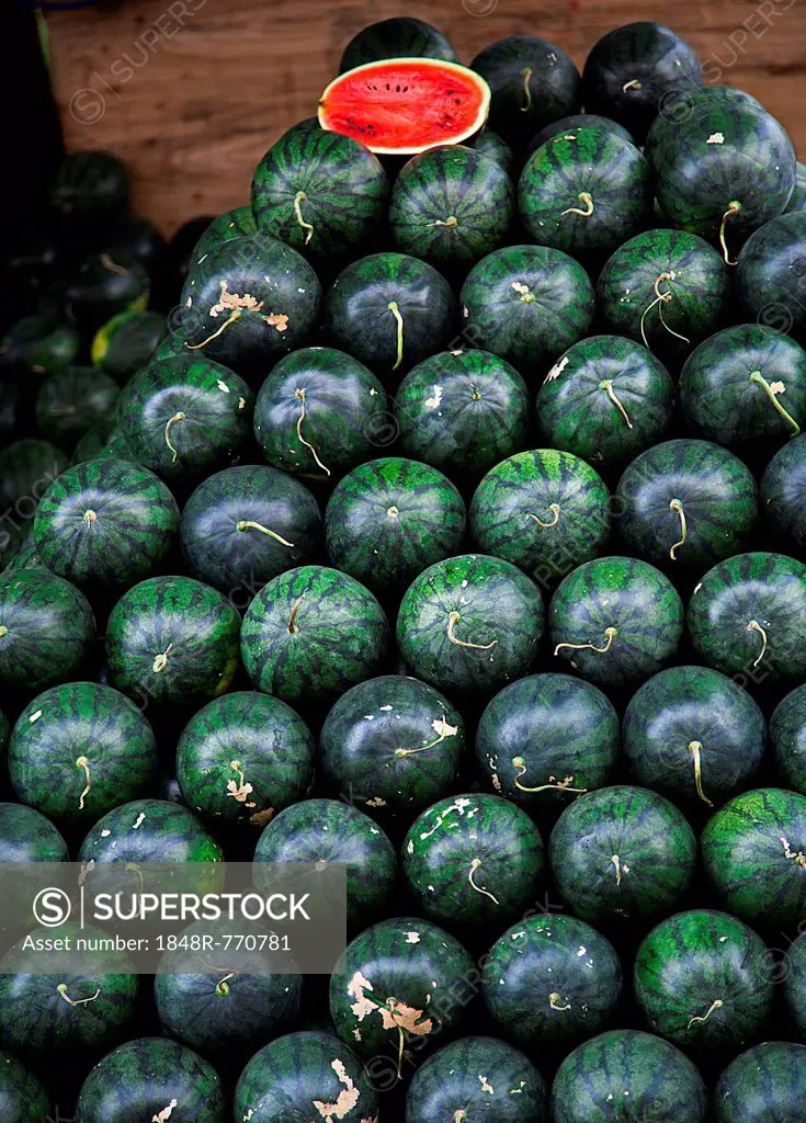 Stacked Watermelons (Citrullus lanatus) with a half cut melon, Chiang Mai, Northern Thailand, Thailand