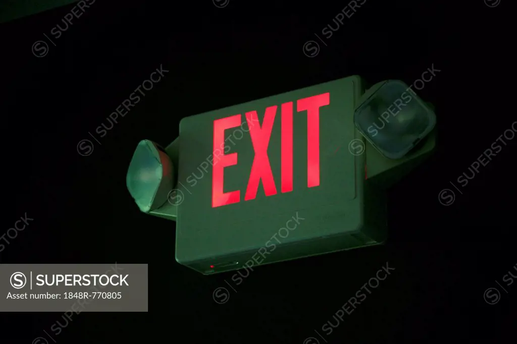 Illuminated Exit sign in a restaurant, USA