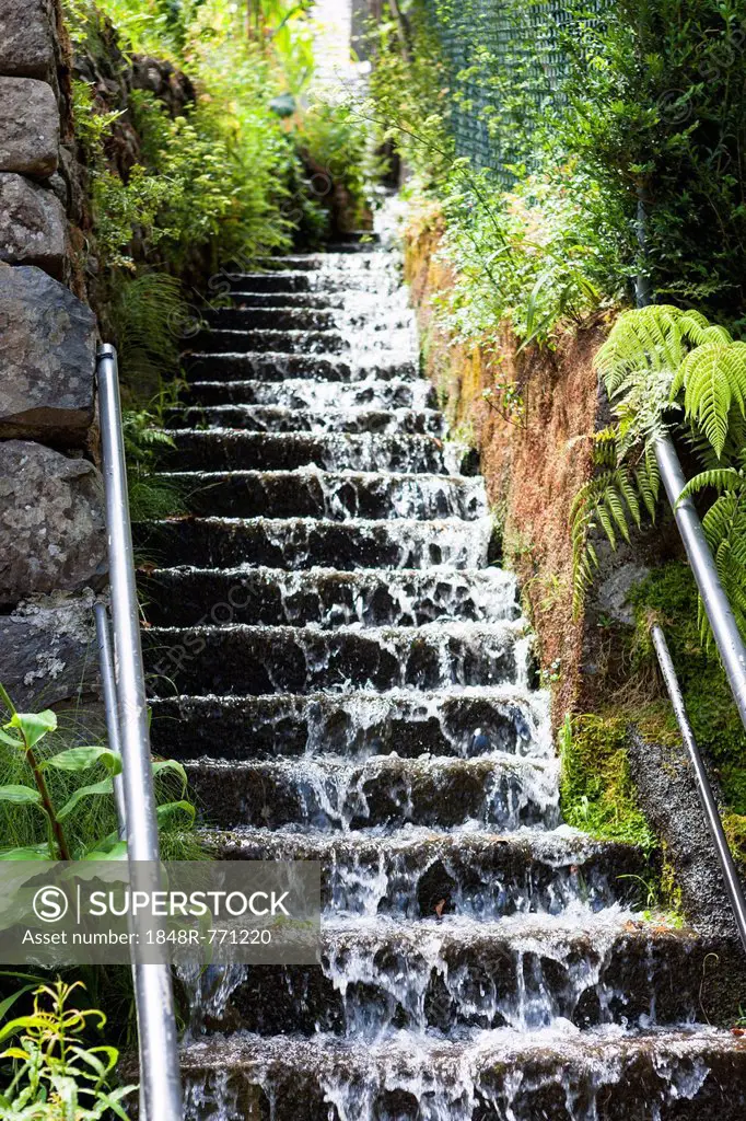 Water running down a stone staircase after a heavy rainfall, Funchal, Boaventura, Madeira, Portugal