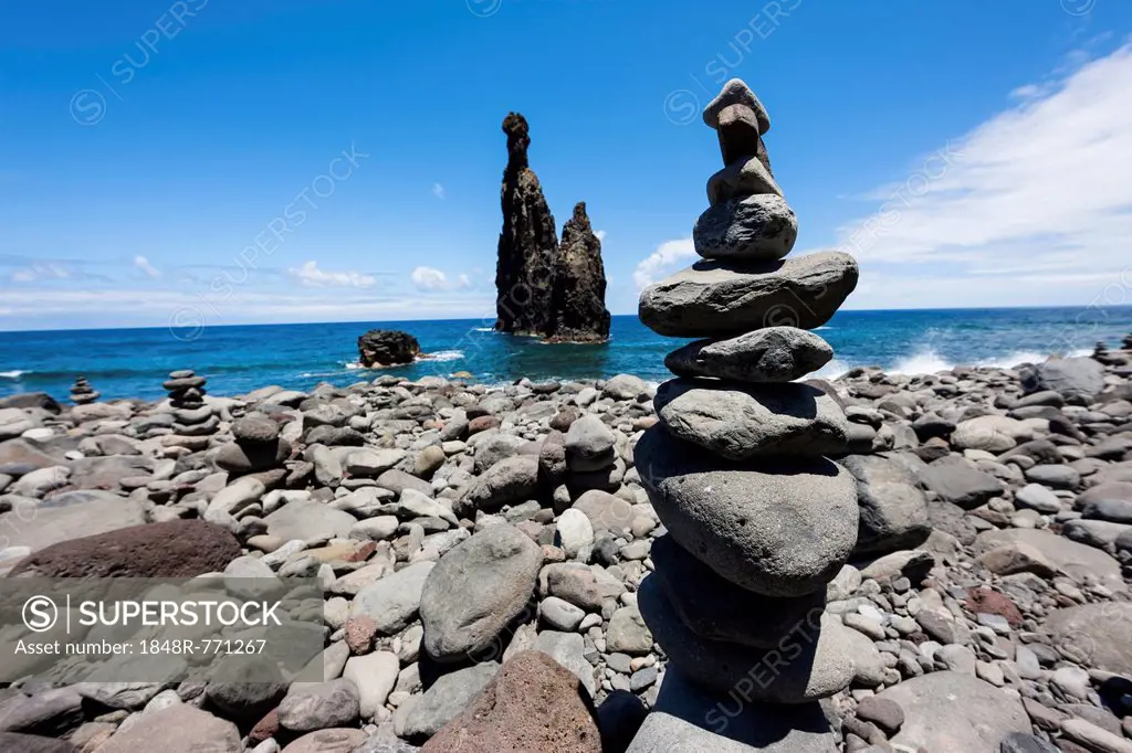 Cairns built as good luck charms at the Ilheus da Rib rock formation, on the cliff coast of Ribeira da Janela, Lanceiros, Ribeira da Janela, Madeira, ...