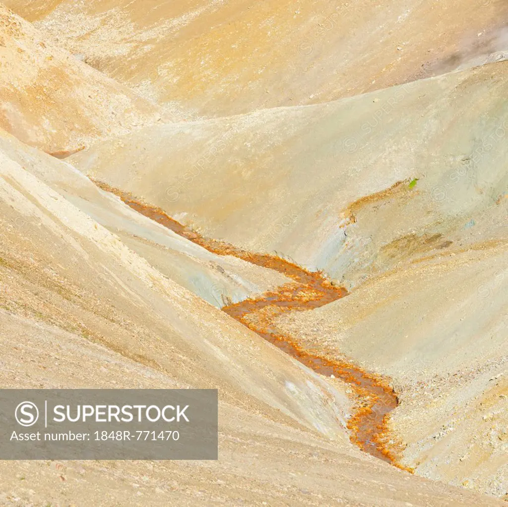 Stream bed coloured by iron oxide, Landmannalaugar, Southern Region, Iceland