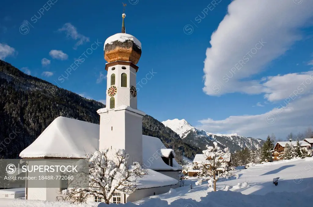 Snow-covered church, St Gallenkirch, Montafon, Vorarlberg, Austria
