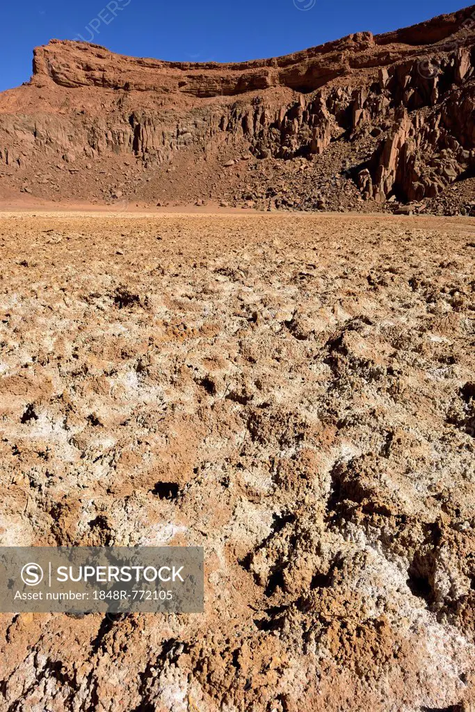 Salt pan in the volcanic landscape of lower Ouksem crater, Menzaz, Tamanrasset Province, Algeria