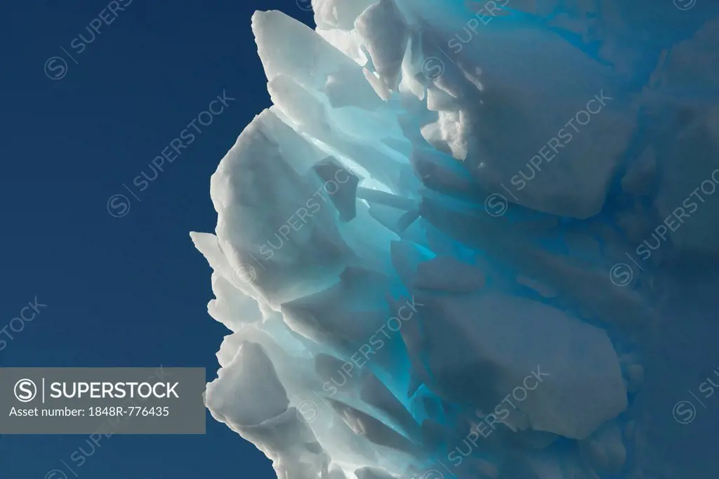 Iceberg, detail with backlighting, Charlotte Bay, Antarctic Peninsula, Antarctica