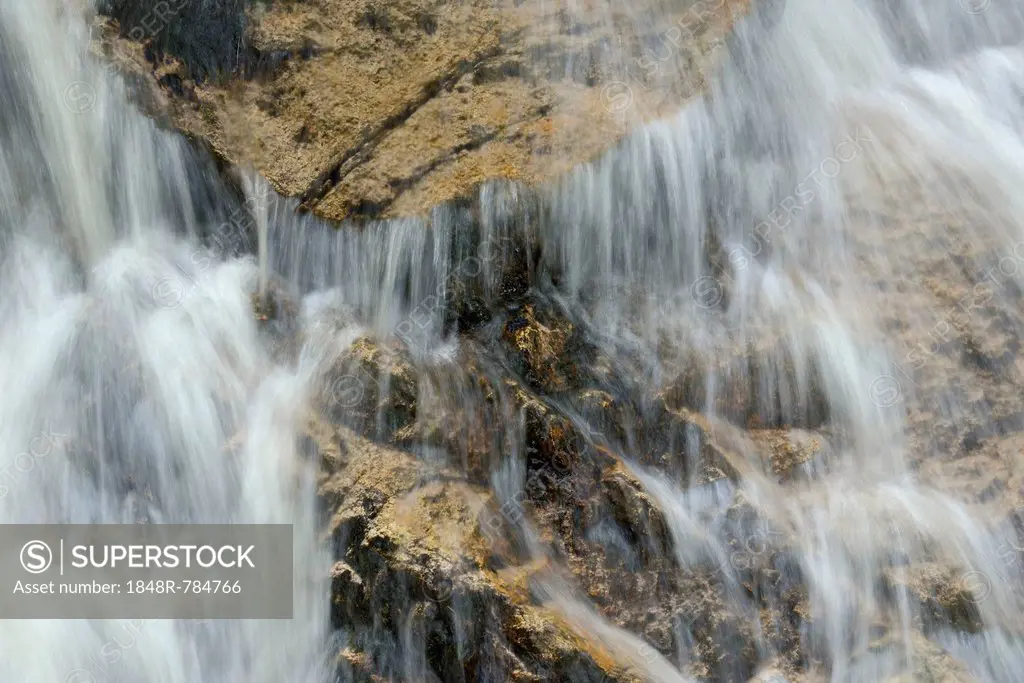 Water cascade, water flowing over rocks in the stream bed of the Ilse River, Ilsenburg, Saxony-Anhalt, Germany
