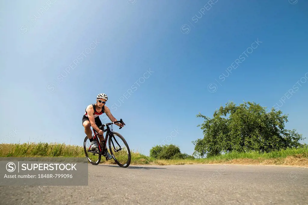 Cyclist, 44 years, riding a racing cycle, Winterbach, Baden-Württemberg, Germany