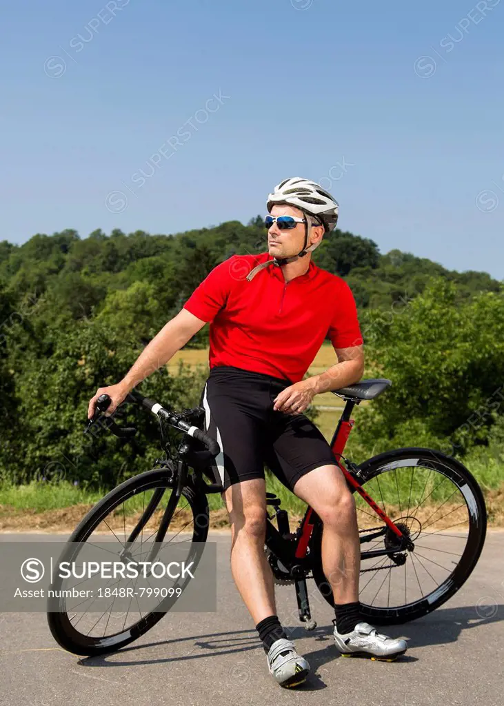 Cyclist, 44 years, with a racing cycle, Winterbach, Baden-Württemberg, Germany